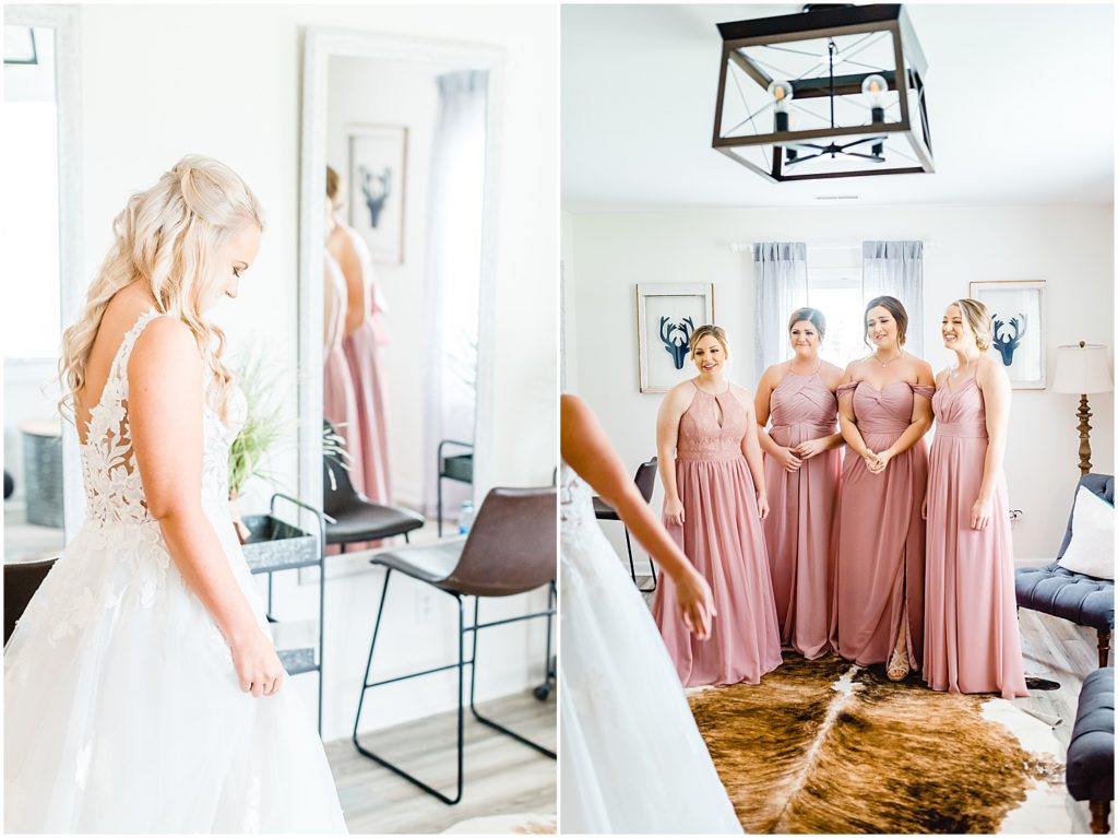 bride revealing her dress to her bridesmaids on wedding day