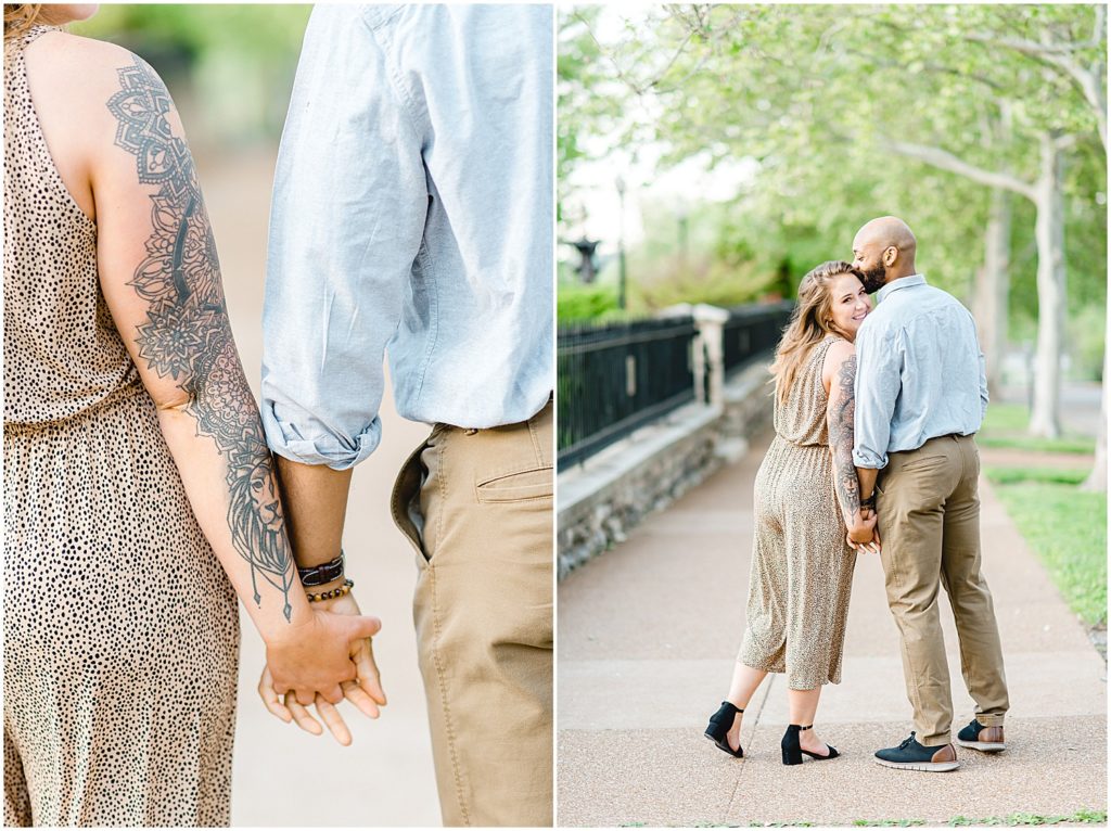 couple holds hands on sidewalk during jefferson city engagement session in front of governor's mansion