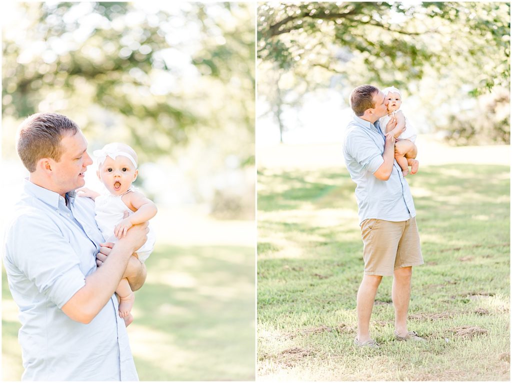 young father holding baby girl and giving her a kiss family portrait session