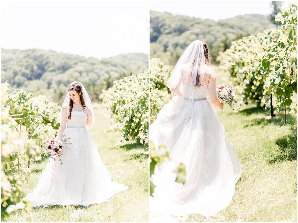 bride standing in vineyard with bouquet