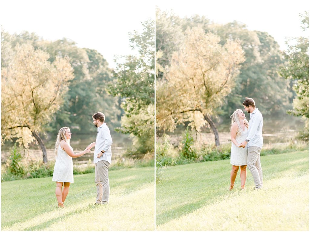 Cooper's ridge engagement session couple spinning in field of grass