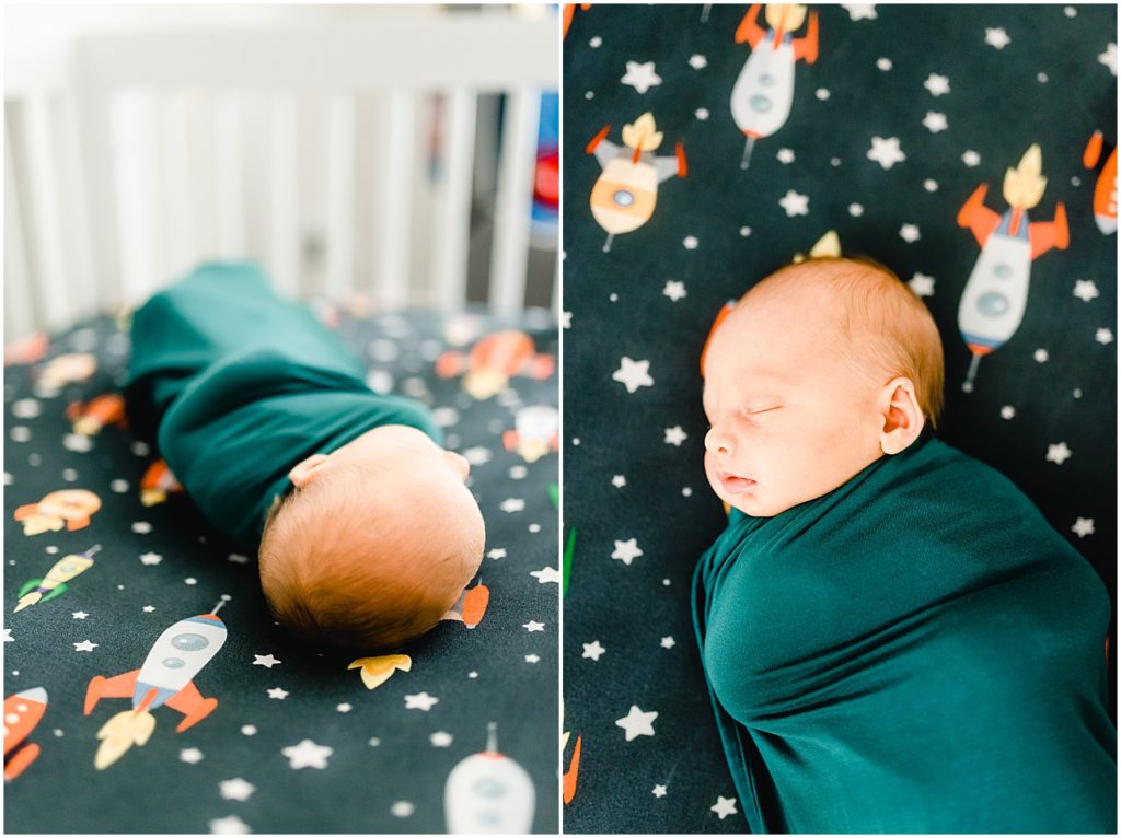 newborn baby on space themed crib sheets