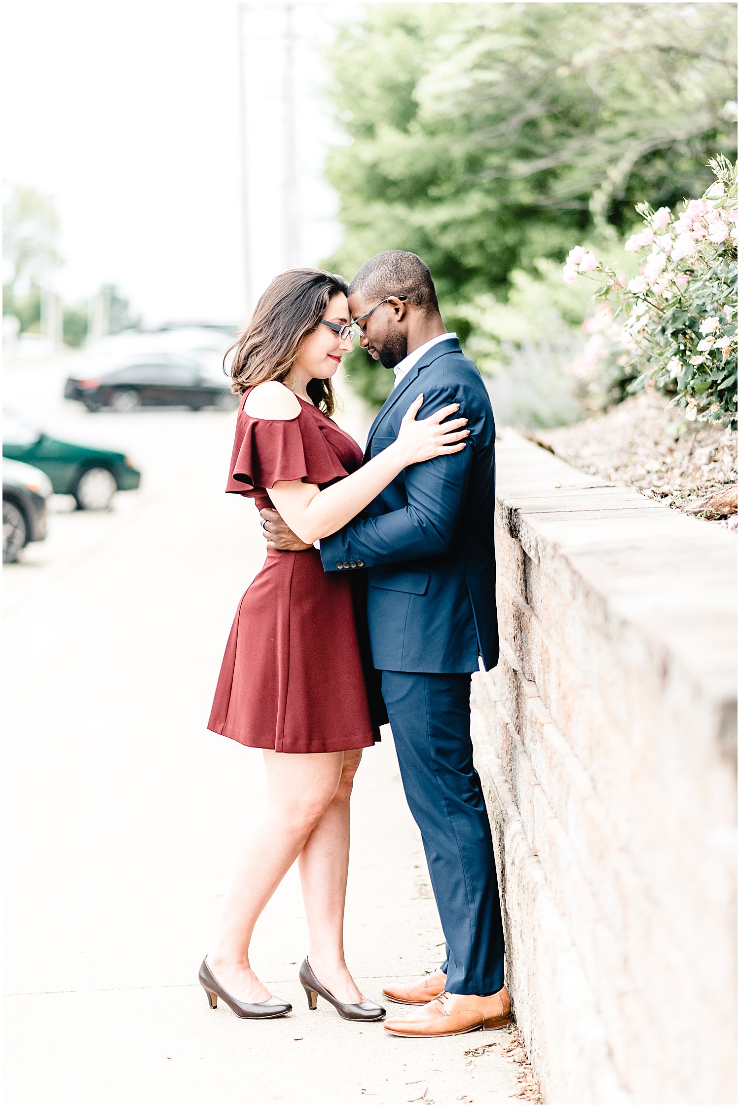 Downtown jefferson city river overlook engagement session couple standing on sidewalk