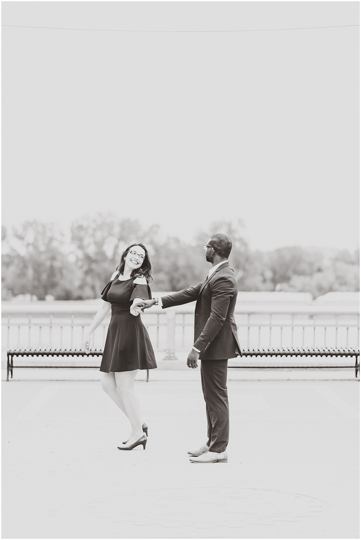 Downtown jefferson city river overlook engagement session couple dancing in parking lot