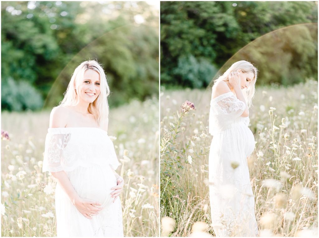 pregnant mom in long white dress with sun flare around her holding belly