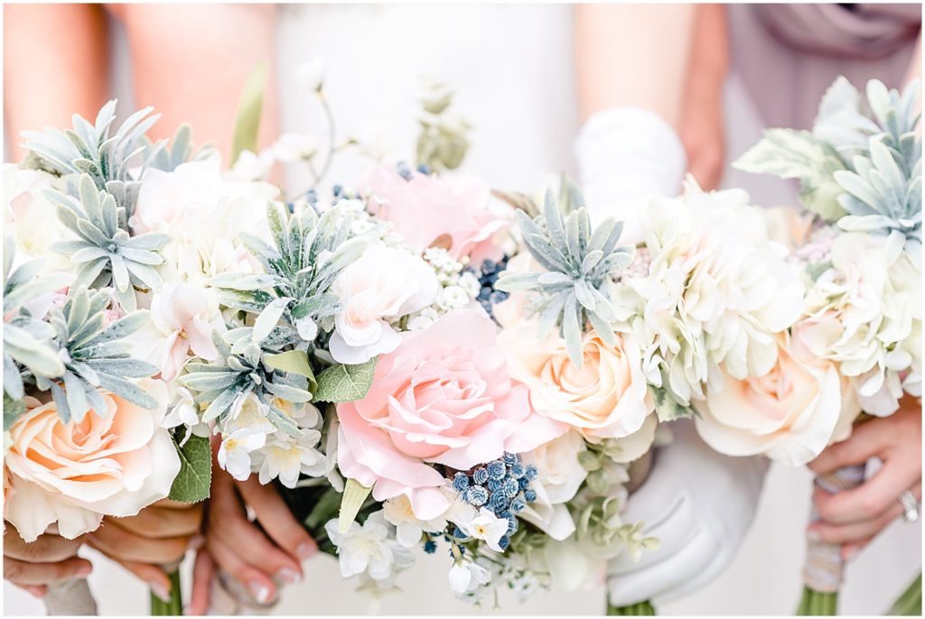 bouquet together in front of bridal party