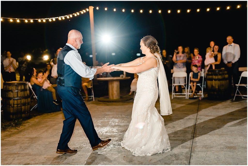 bride and dad first dance outdoor reception patio