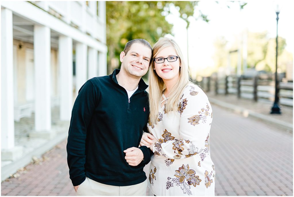 couple smiling together for engagement picture