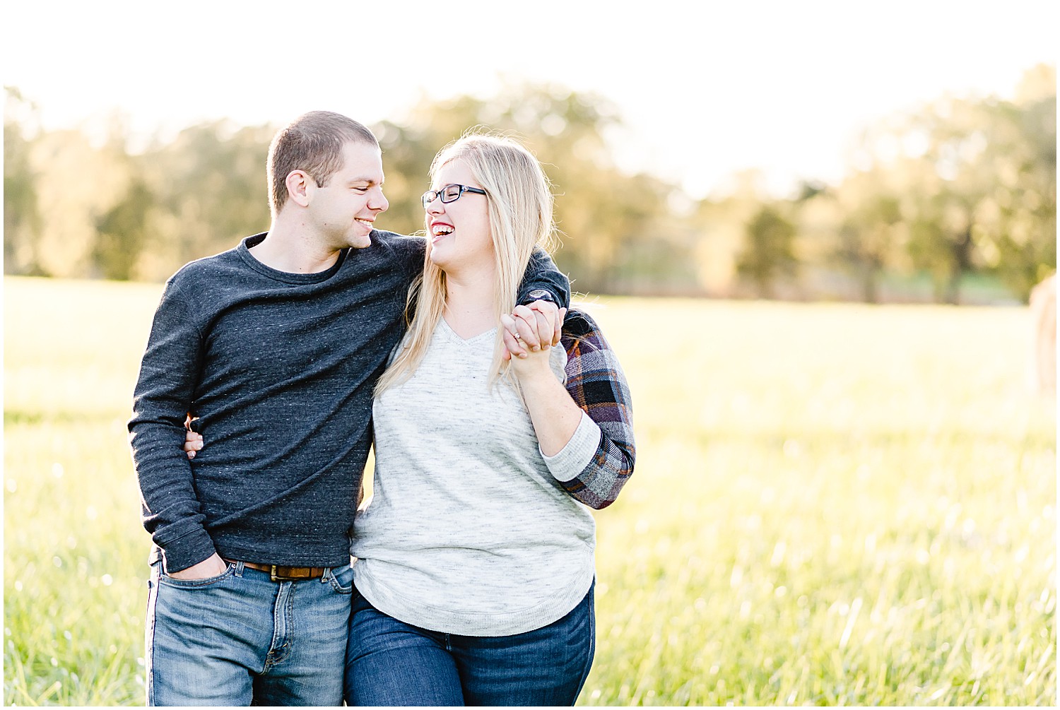 laughing couple engagement session kempker's back 40