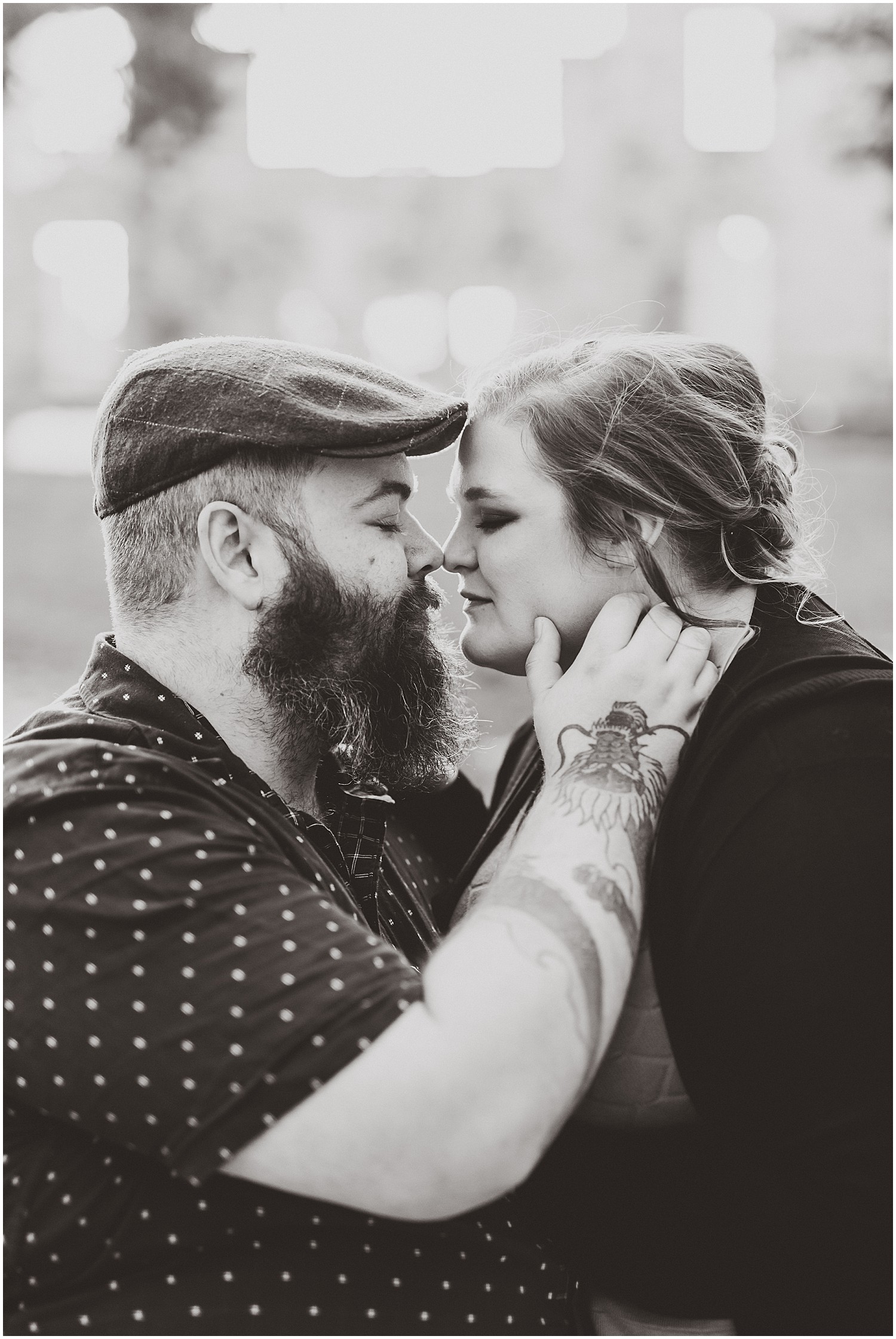 black and white couple touching noses kissing 