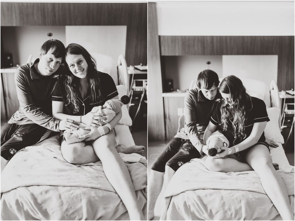 black and white of parents holding new baby fresh 48 session