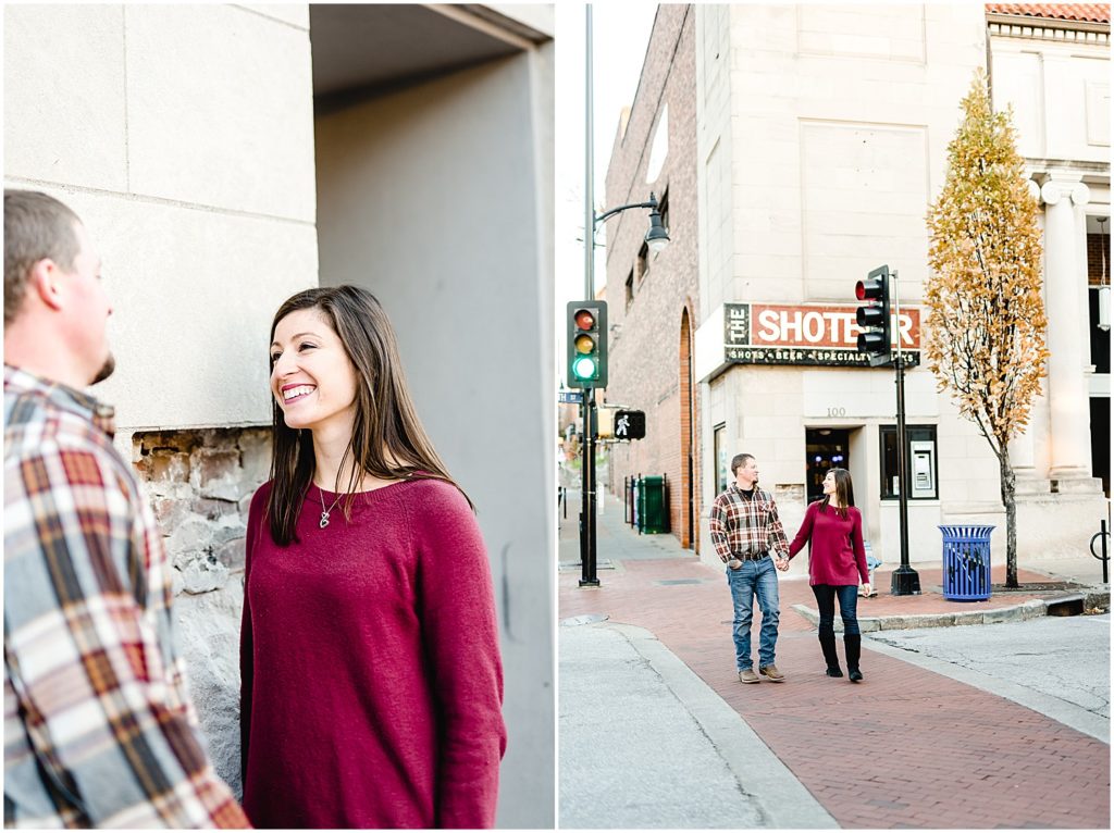couple smiling and walking in street by bar downtown columbia, mo engagement session
