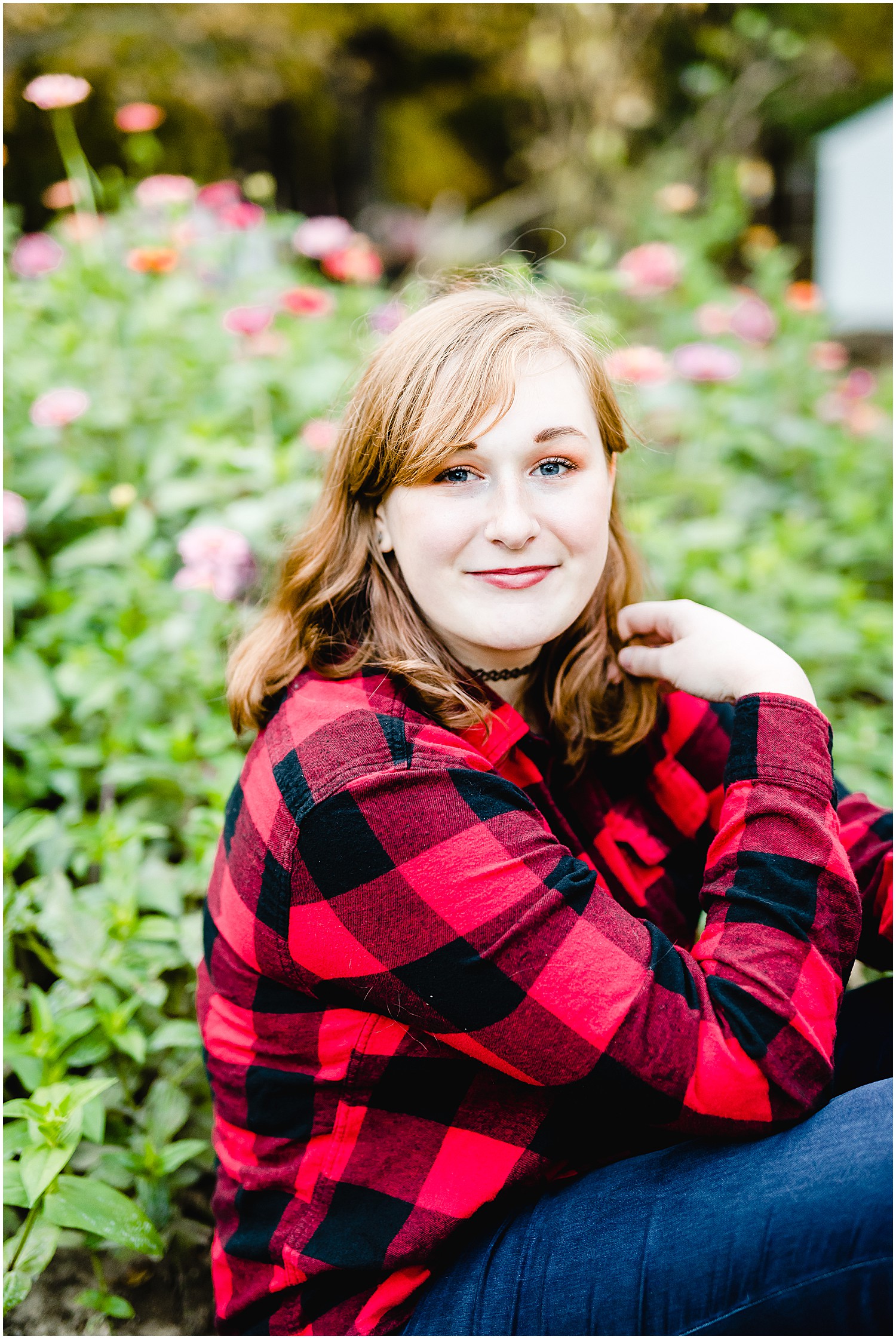 girl senior session sitting in flowers holts summit senior session