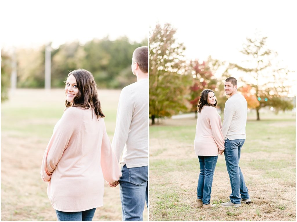expecting couple walking away fall sunset maternity session