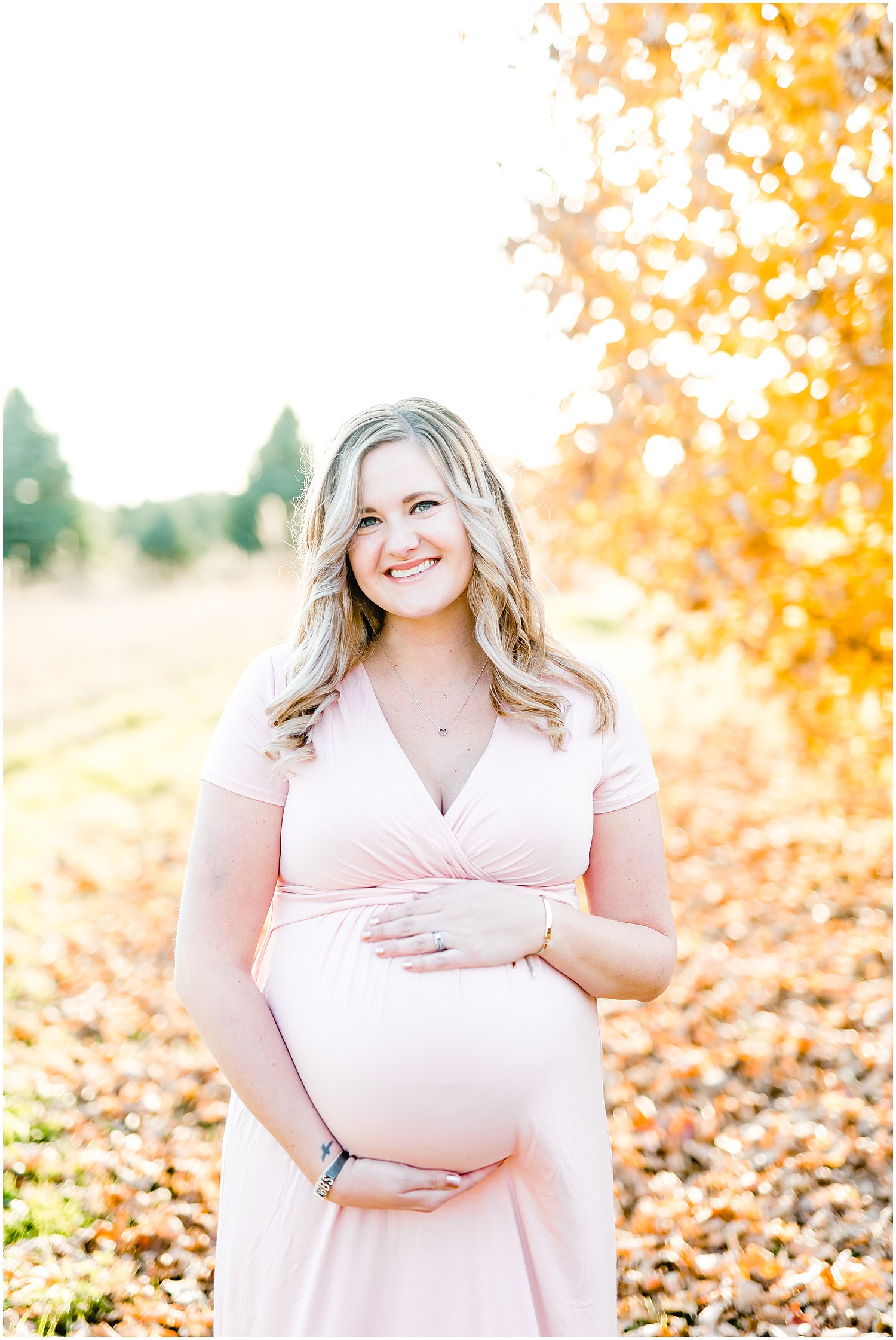 pink dress maternity session expecting mom by tree