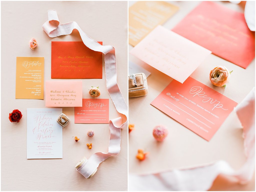 pink and coral invitation suite flat lay