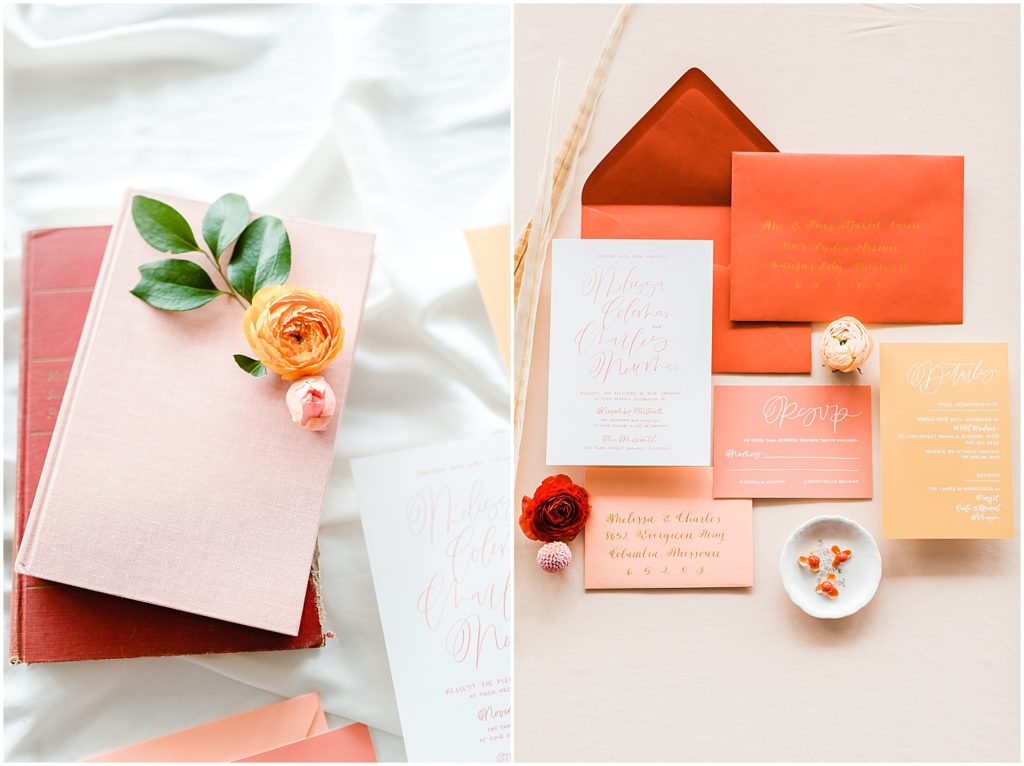 pink invitation suite flat lay flower on books