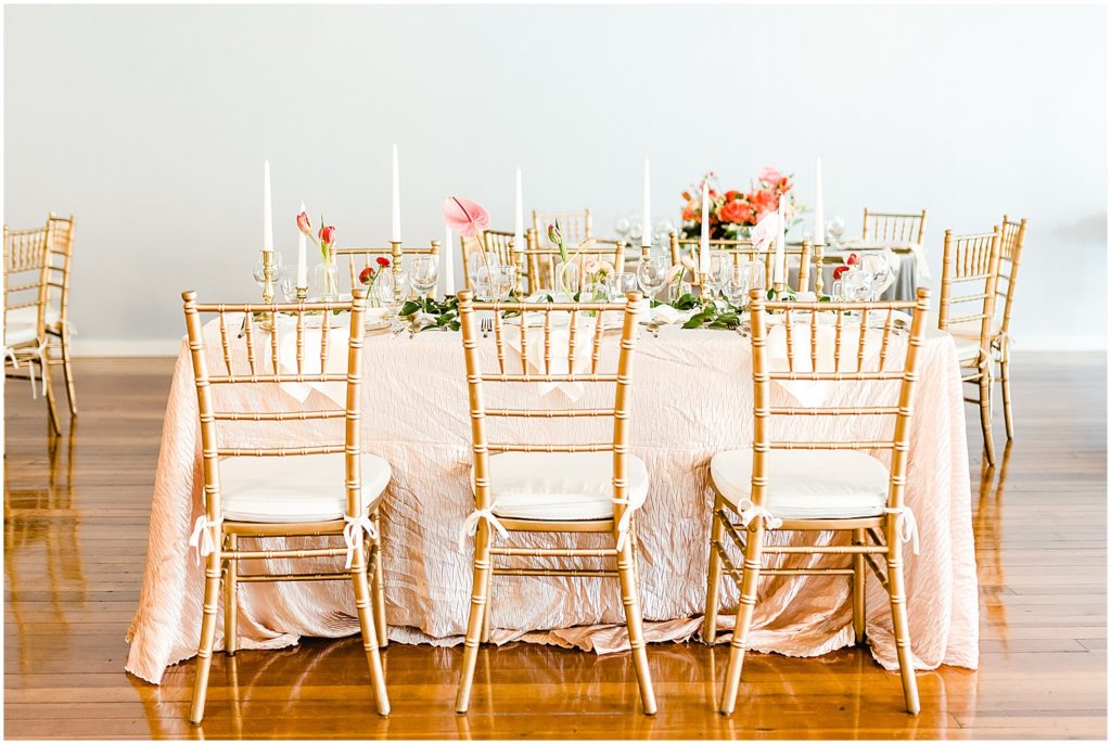 gold chairs table setting details