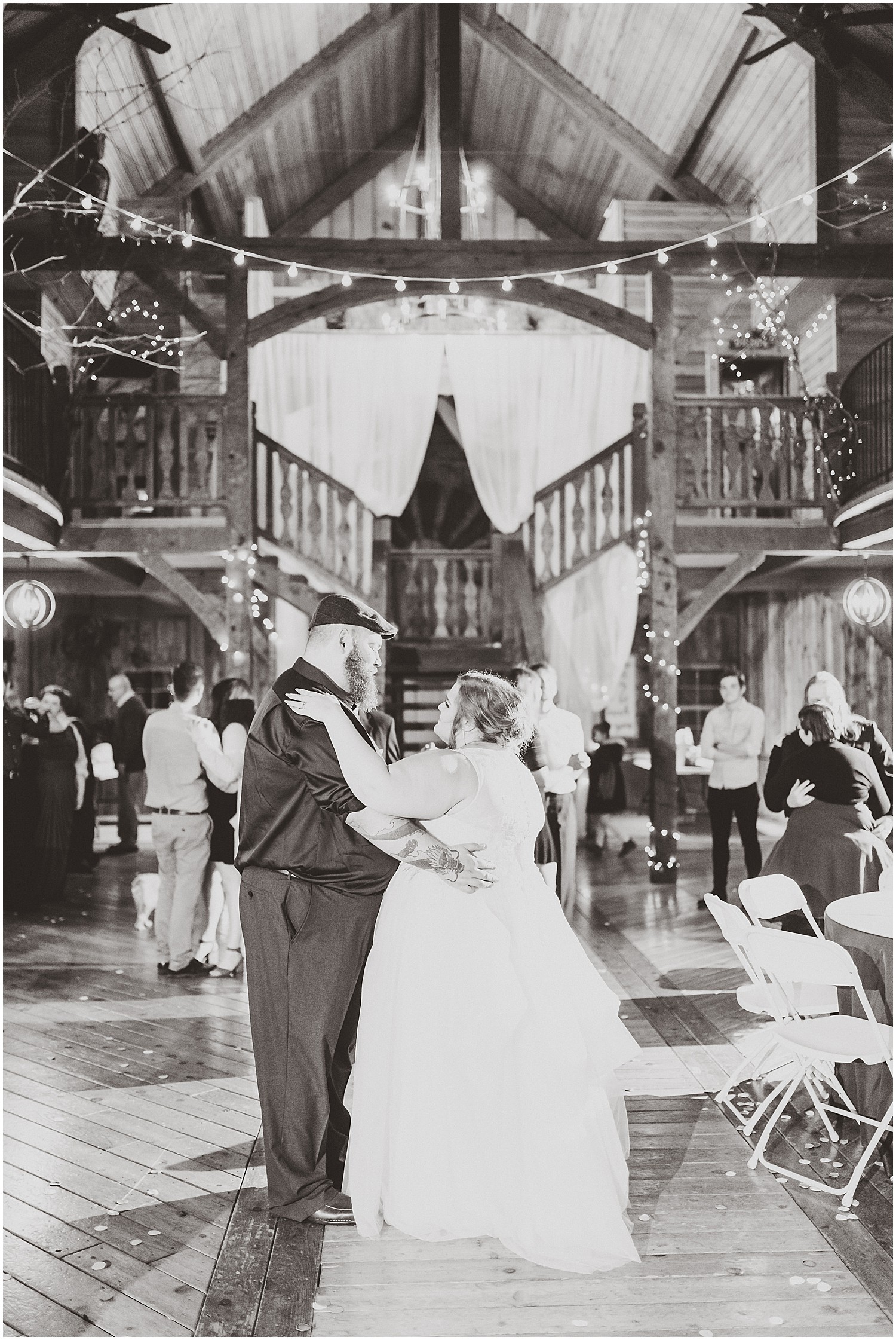 bride and groom first dance black and white weathered wisdom barn wedding
