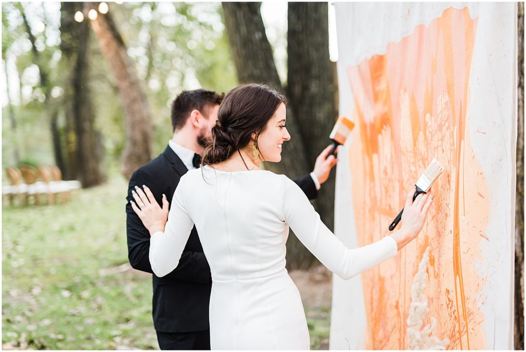 bride painting on canvas wildcliff wedding