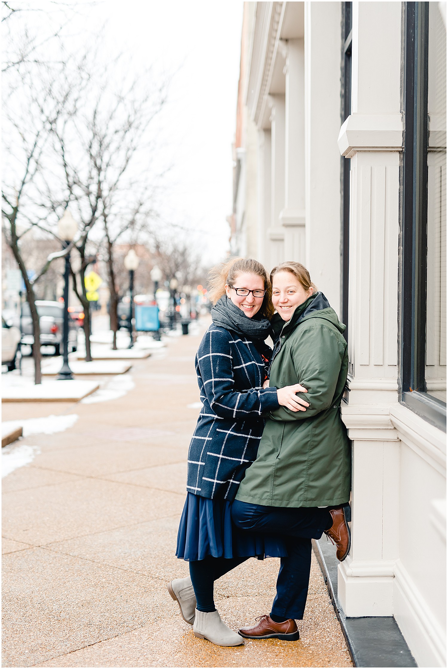 female couple posing downtown jefferson city