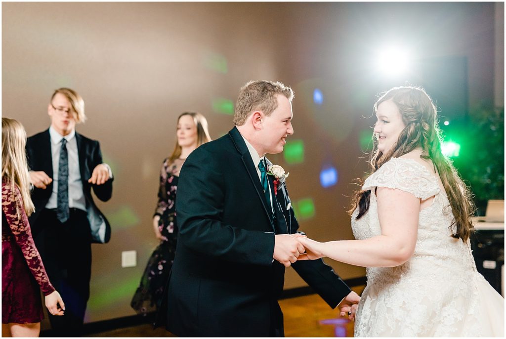 bride and groom dancing during wedding reception