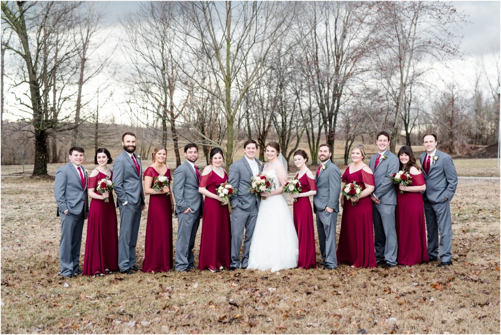 wedding party in gray and wine colored dresses