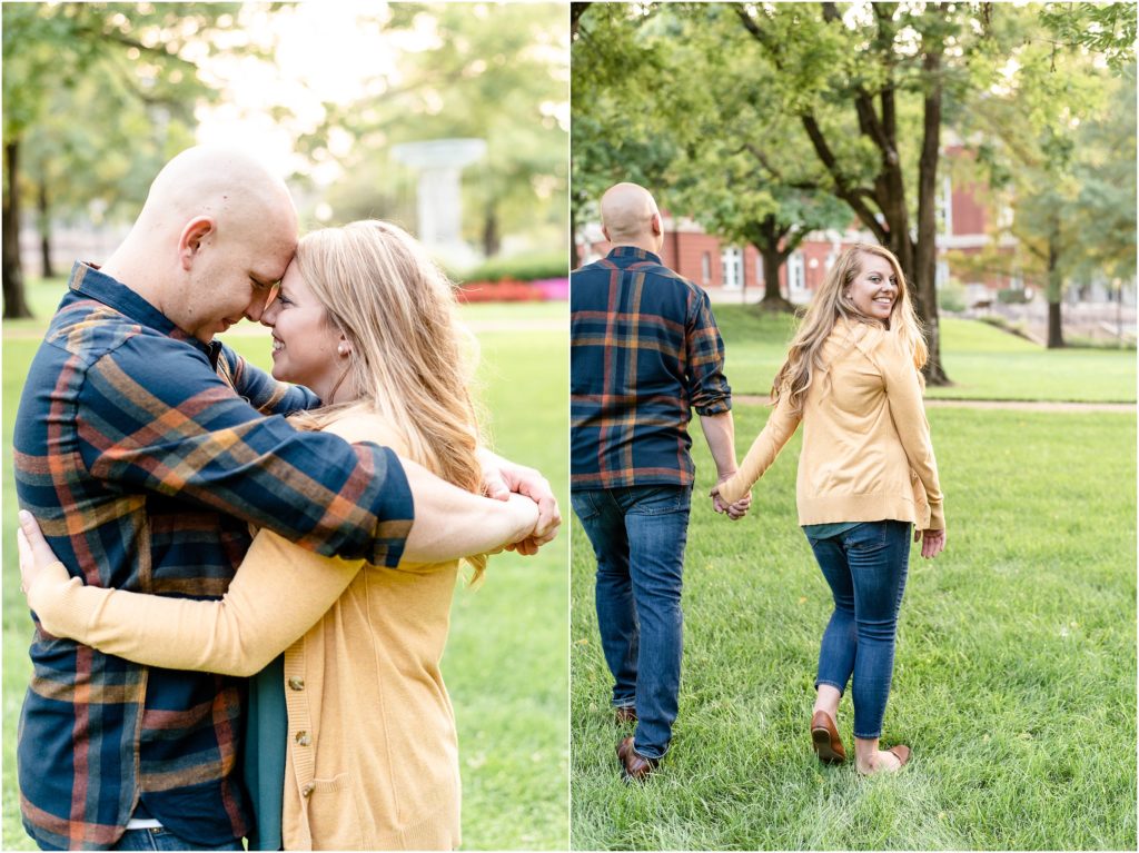 engaged couple wearing mustard and blue colors walking in grass for engagement photos outside missouri state capitol building
