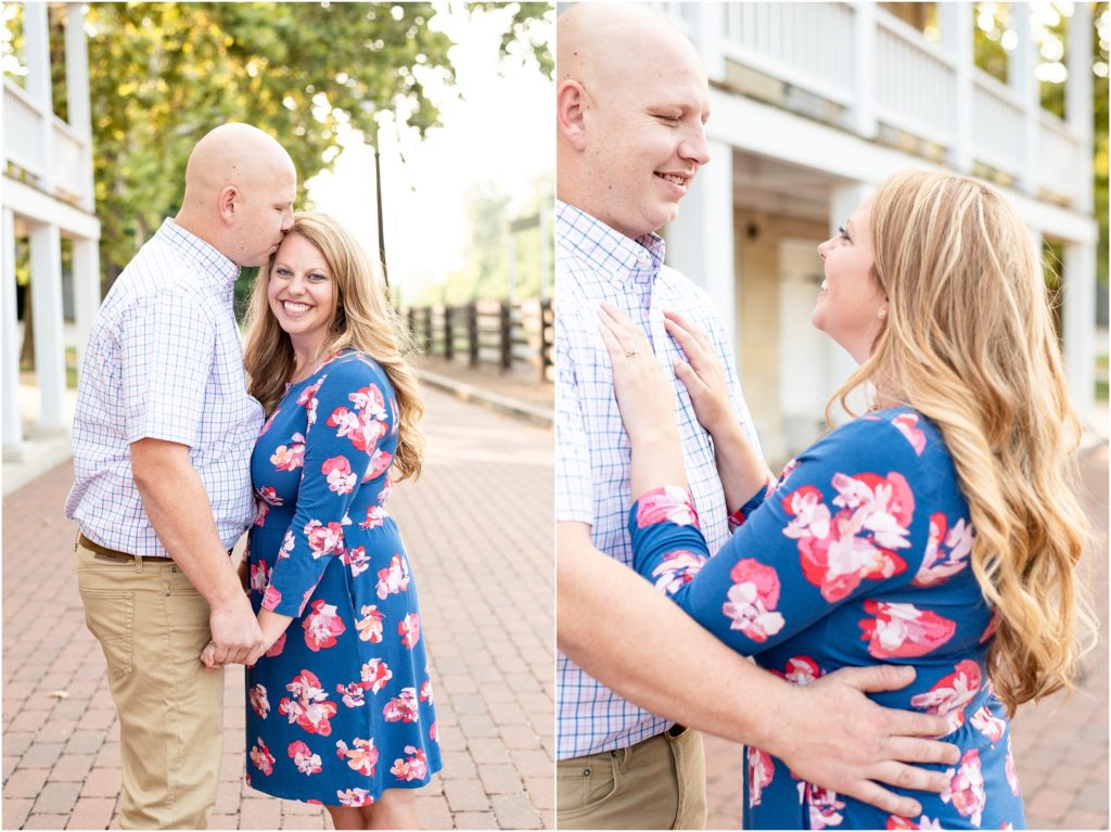 engaged couple kissing on brick path for engagement session in Jefferson City