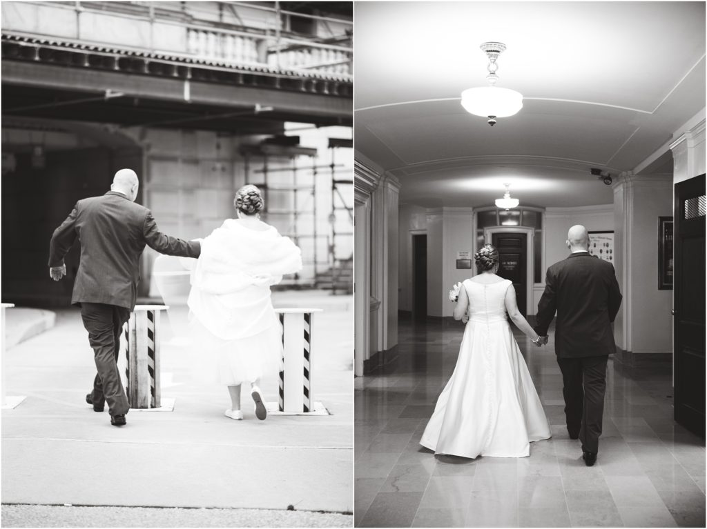 black and white image of bride and groom walking away together to wedding ceremony