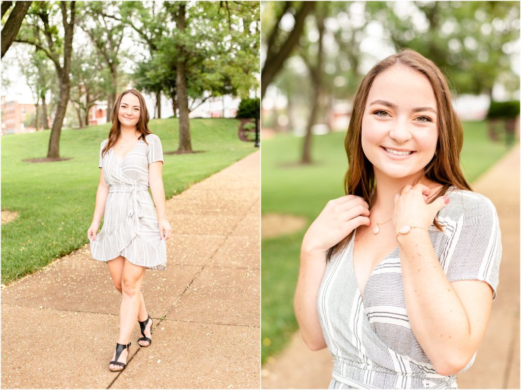 senior girl wearing black and white dress posing for senior photos on sidewalks in downtown Jefferson City