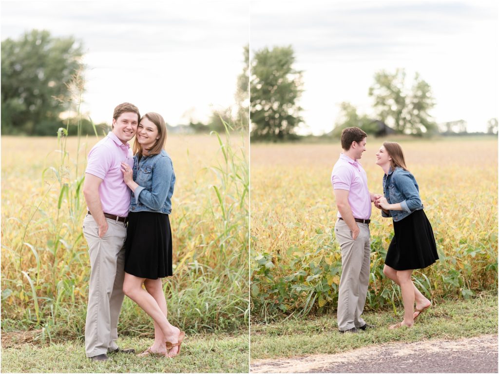 engaged couple smiling in field for engagement photos