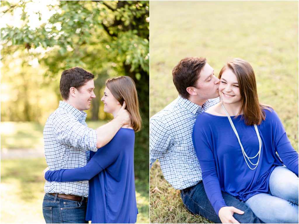 engaged couple sitting together on grass for engagement photos