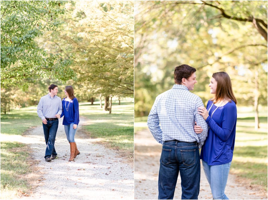couple walking on gravel path for engagement session at quigg commons park