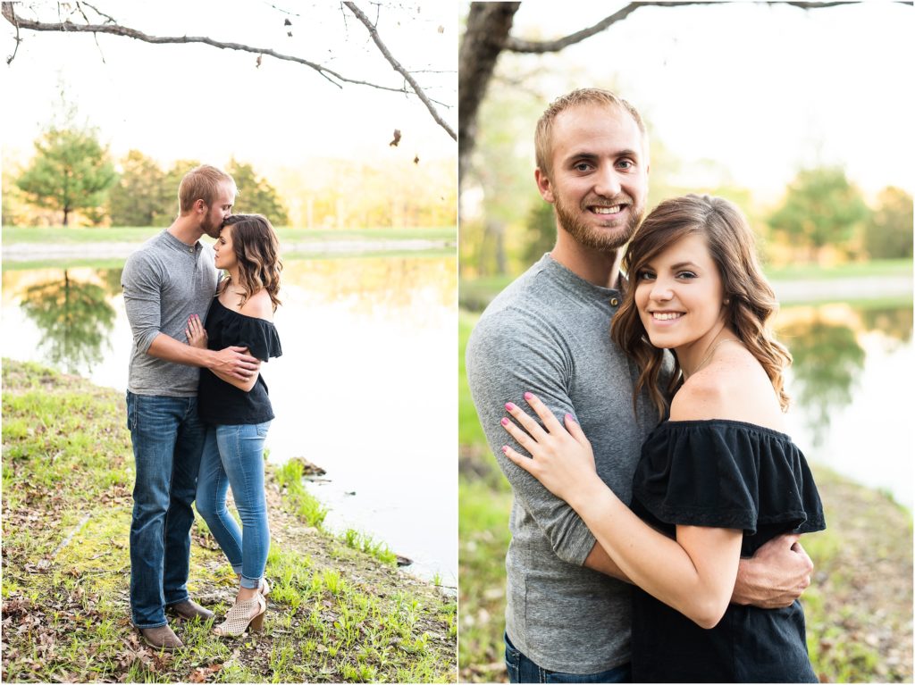 couple standing under trees in front of lake for linn, mo couples session