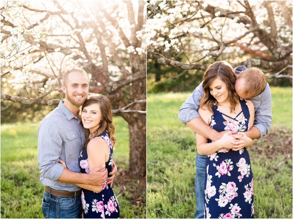 couple kissing and smiling under tree on farm for Linn, MO couples portraits