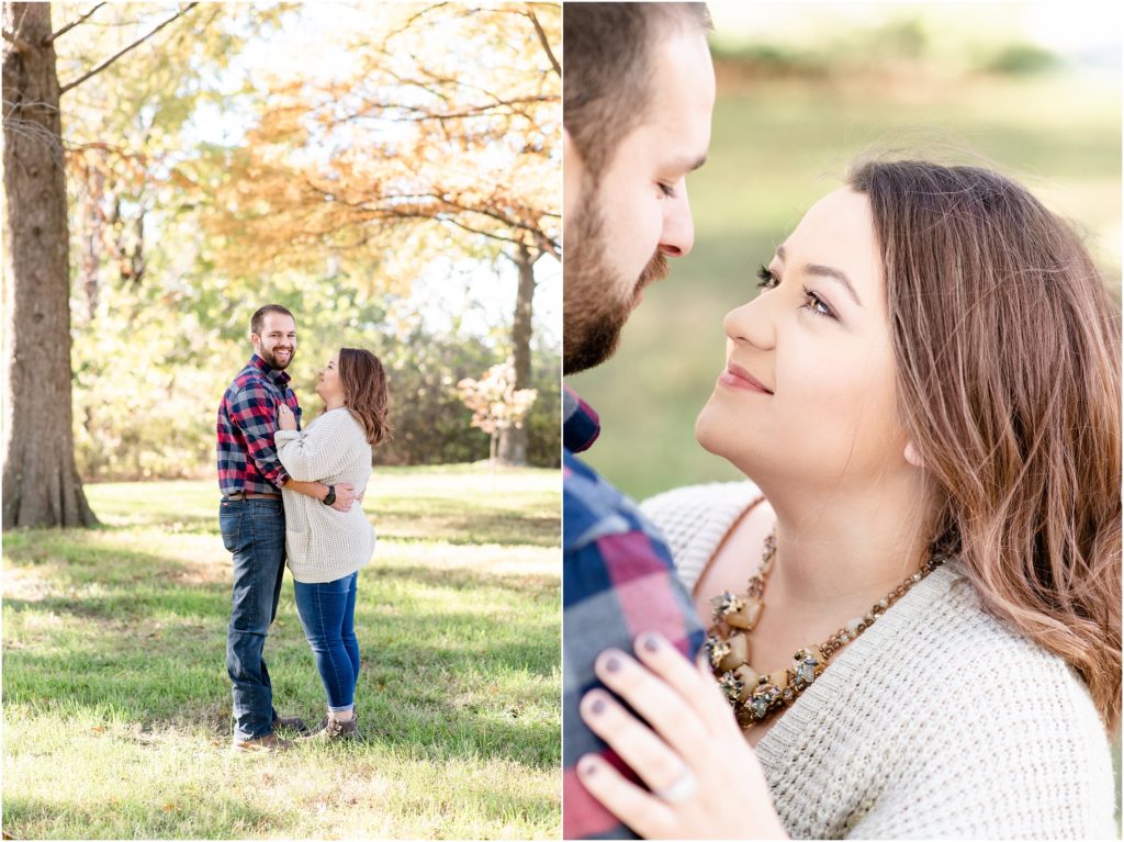 couple looking at each other during engagement session under the trees