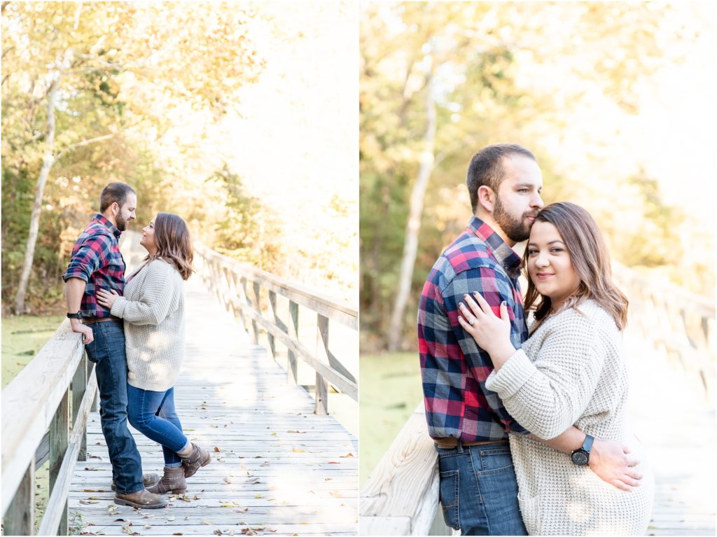 couple standing on wooden bridge at runge nature center for engagement session
