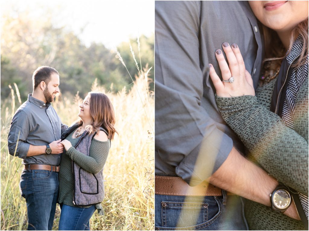couple playing in the grass for engagement session wearing blue and olive for fall engagement session