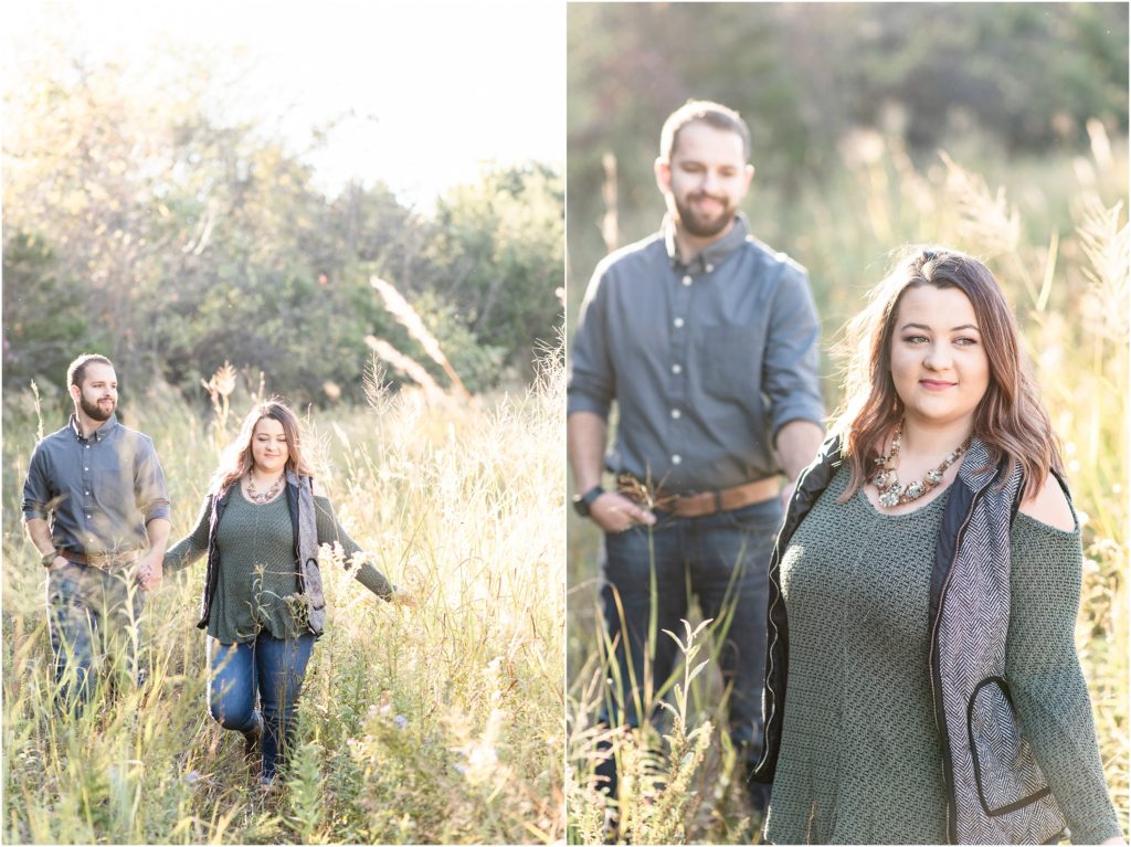 couple walking through tall grasses of runge nature center for engagement session