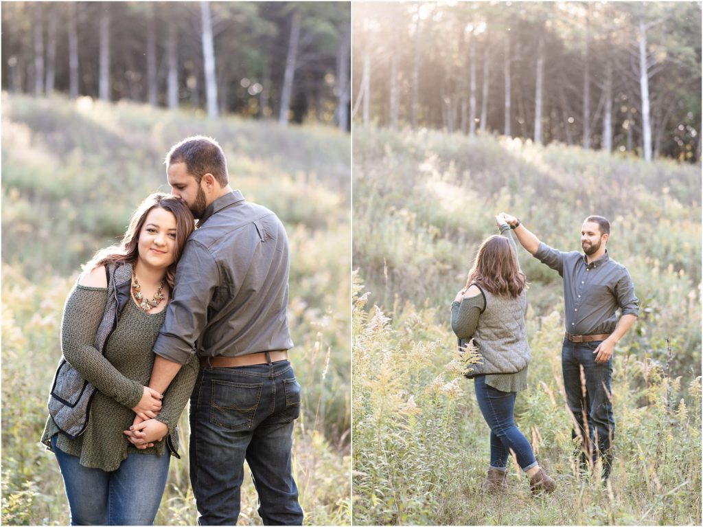 couple dancing in tall grass and sunlight of runge nature center for engagement session