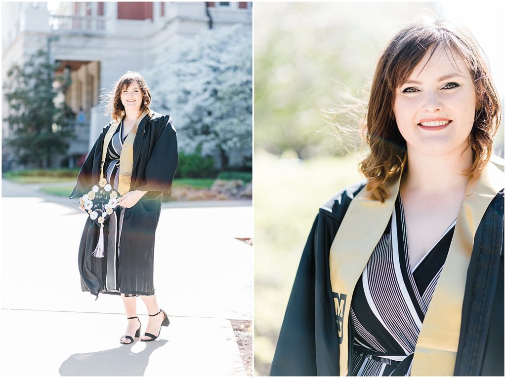 mizzou senior in cap and gown smiling for portraits outside of jesse hall