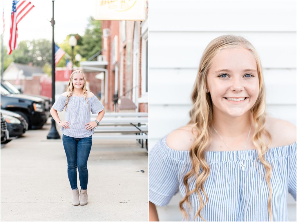 senior girl in jeans and blue shirt posing in downtown Russellville, mo for senior session