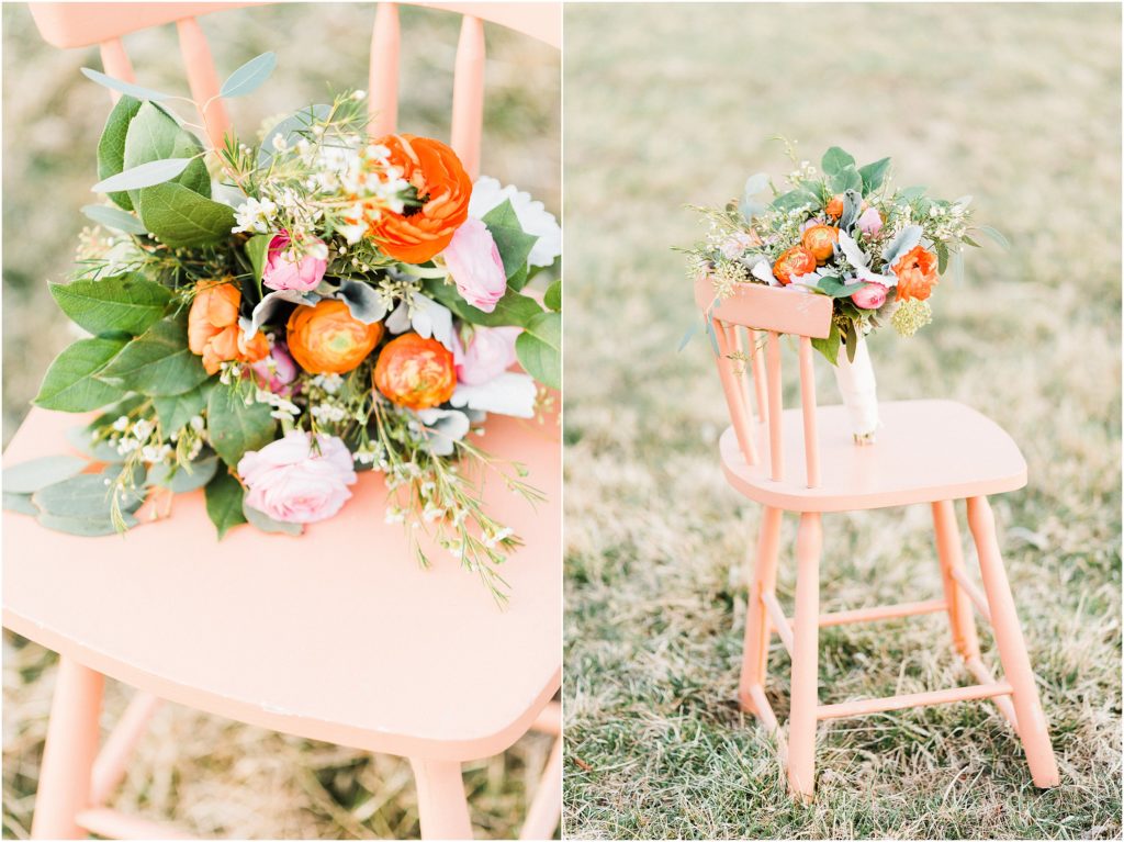 peach and coral bouquet with greenery on peach chair in field