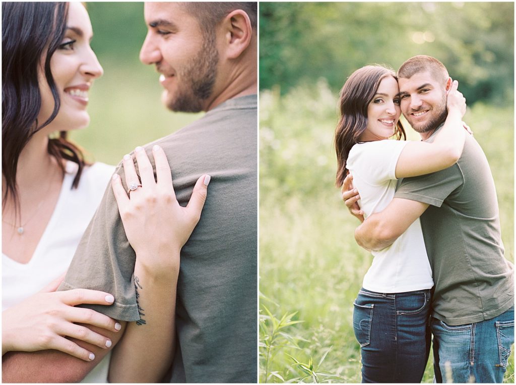 engaged couple smile at the camera while standing in a tall grass field at capen park