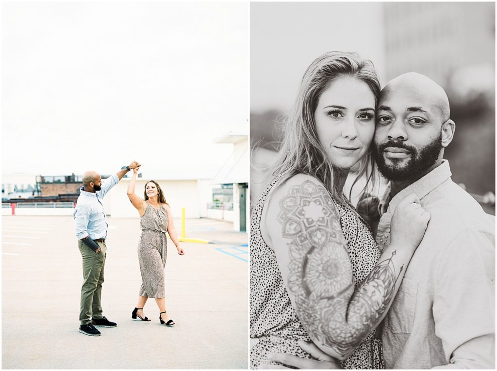 couple dances on top of parking garage and look at camera seriously for engagement photos