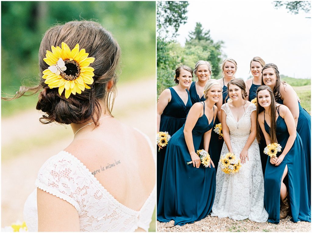 detail of sunflower in bride's hair and bridal party gathered around bride