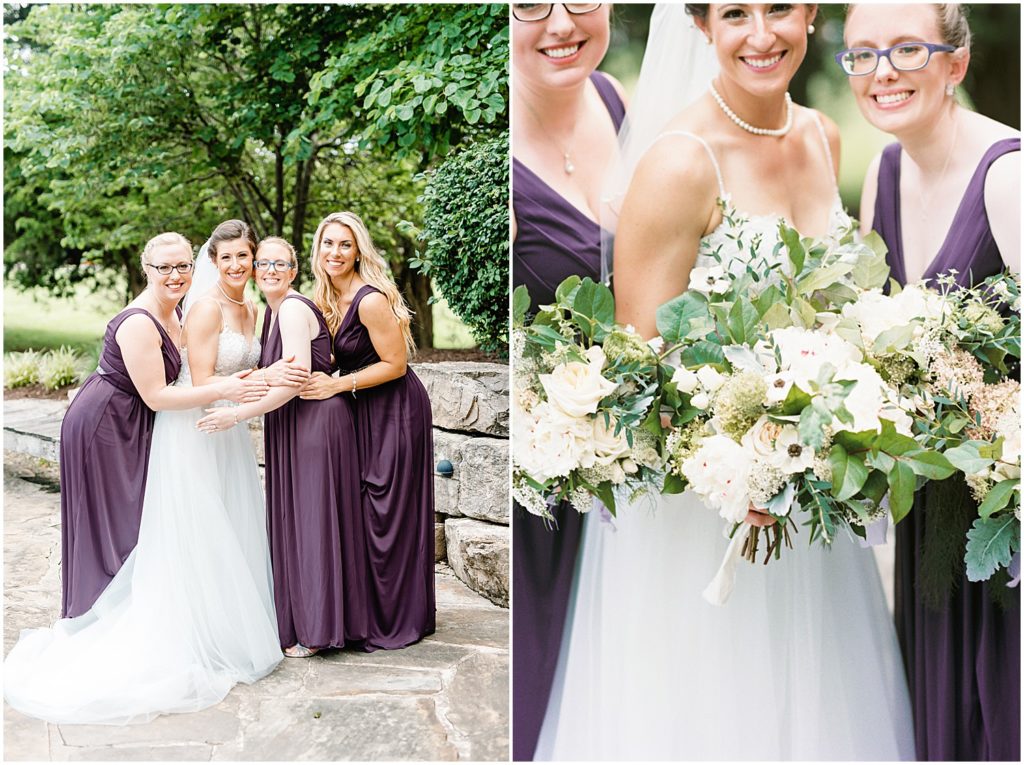 bride and bridesmaids hug as they smile for portraits during cedar lake cellars wedding day