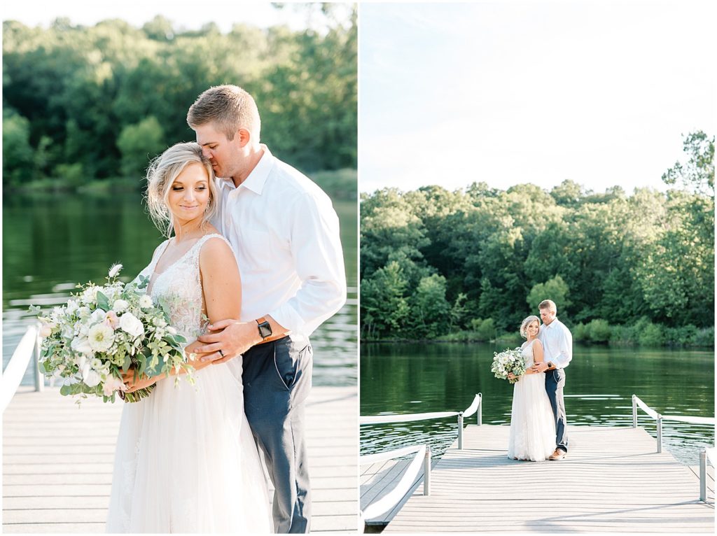 bride and groom standing on dock at little piney lodge during portraits at sunset