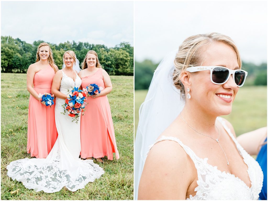 bride with sisters on wedding day during wedding party portraits in field